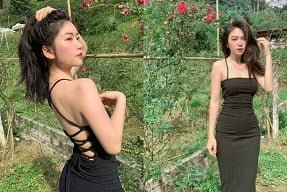 Le Minh Nguyet เยี่ยมชมสวนกุหลาบรักเฟื่องฟูในคืนที่อากาศร้อน